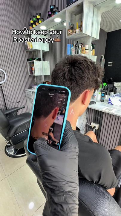A taper haircut with a shaved line design cut into the side