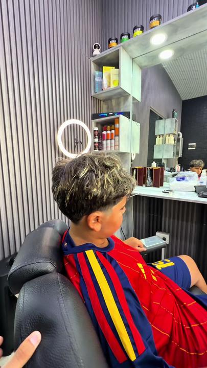 Hair with lightened highlights through the top